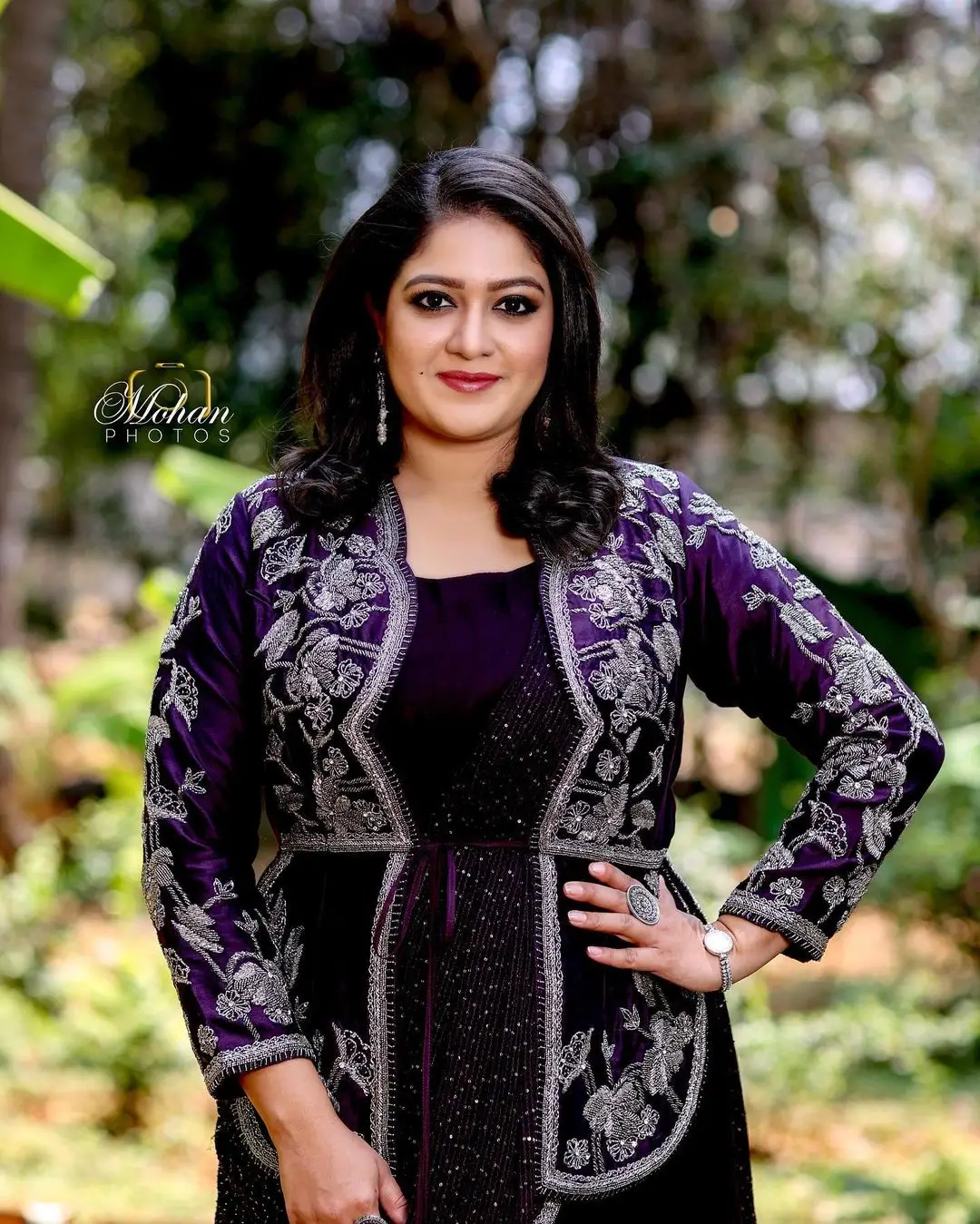 Meghana Raj Wearing Beautiful Earring Black Designer Gown